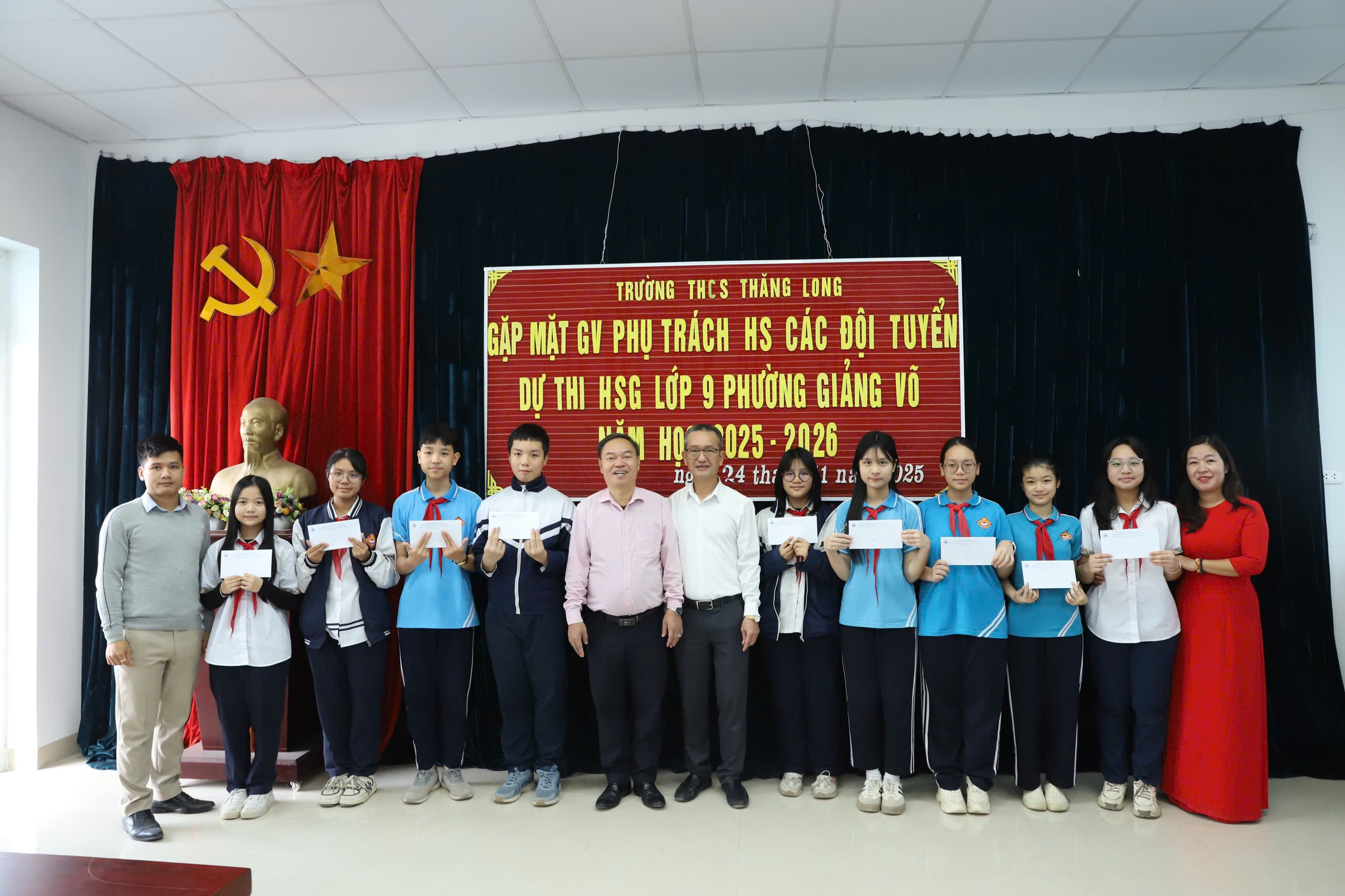 A group of people holding signsAI-generated content may be incorrect.