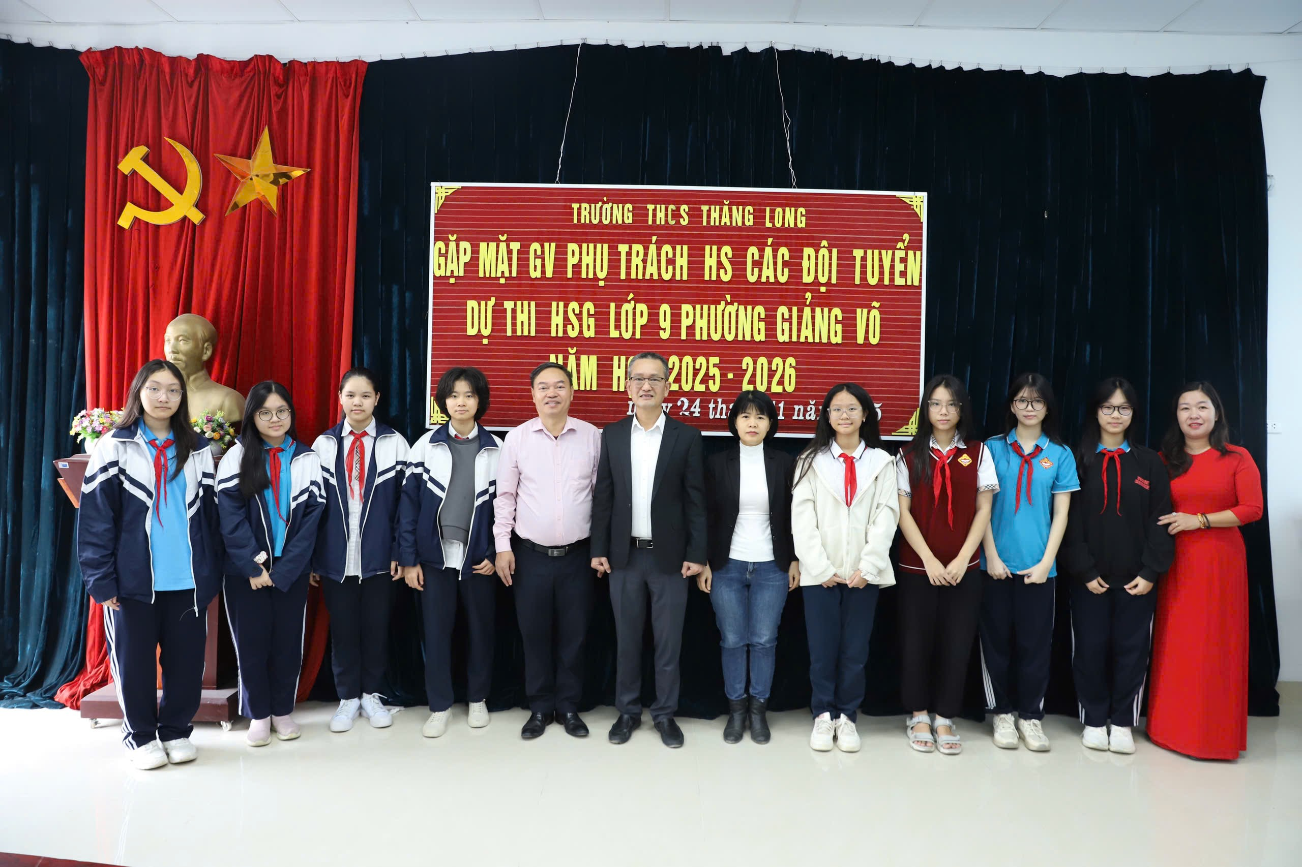 A group of people posing for a photoAI-generated content may be incorrect.