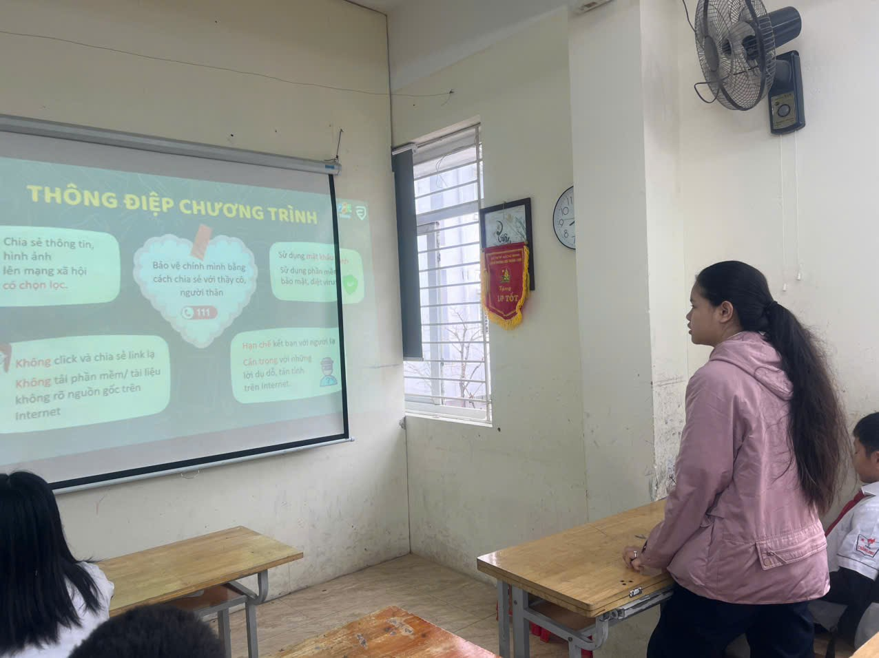 A person standing in front of a screenAI-generated content may be incorrect.