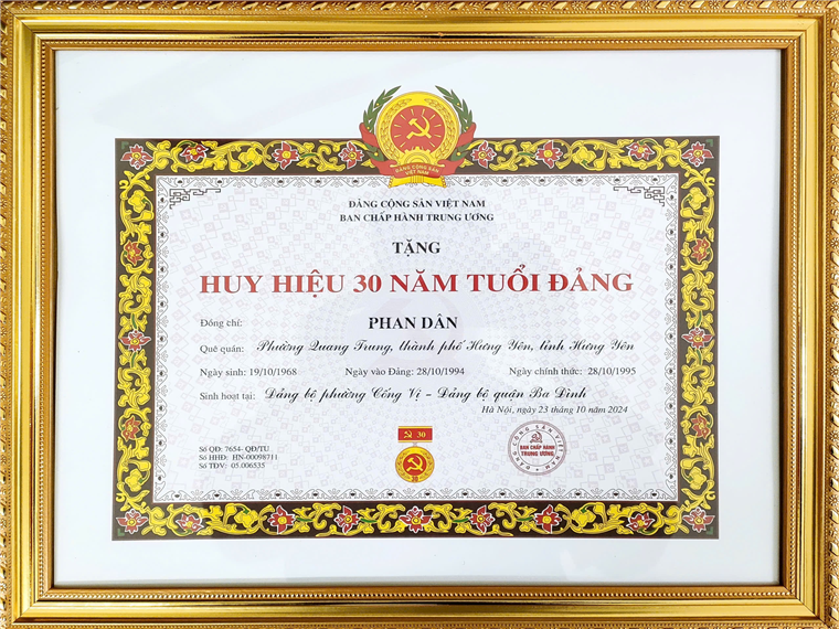 A certificate in a gold frameDescription automatically generated